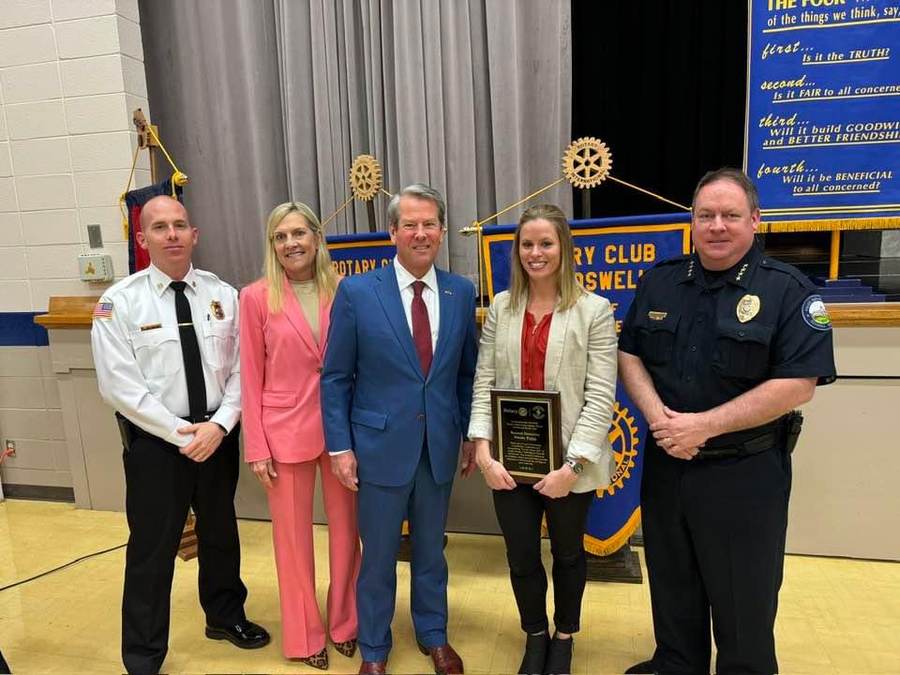 Roswell Police and Fire command staff with Georgia Gov. Brian Kemp at the Rotary Club of Roswell.