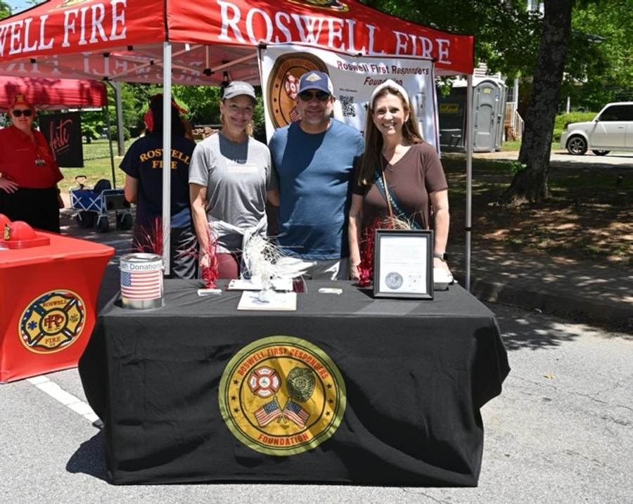 Roswell firefighters and the Alive Roswell community gathering.