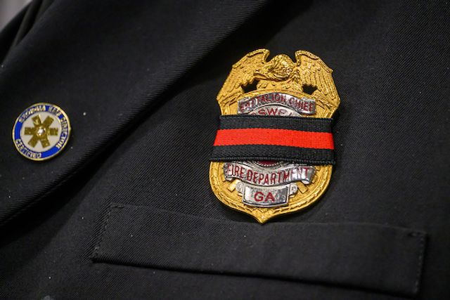 A Roswell Police badge — symbol of the officers RFRF supports through financial assistance.